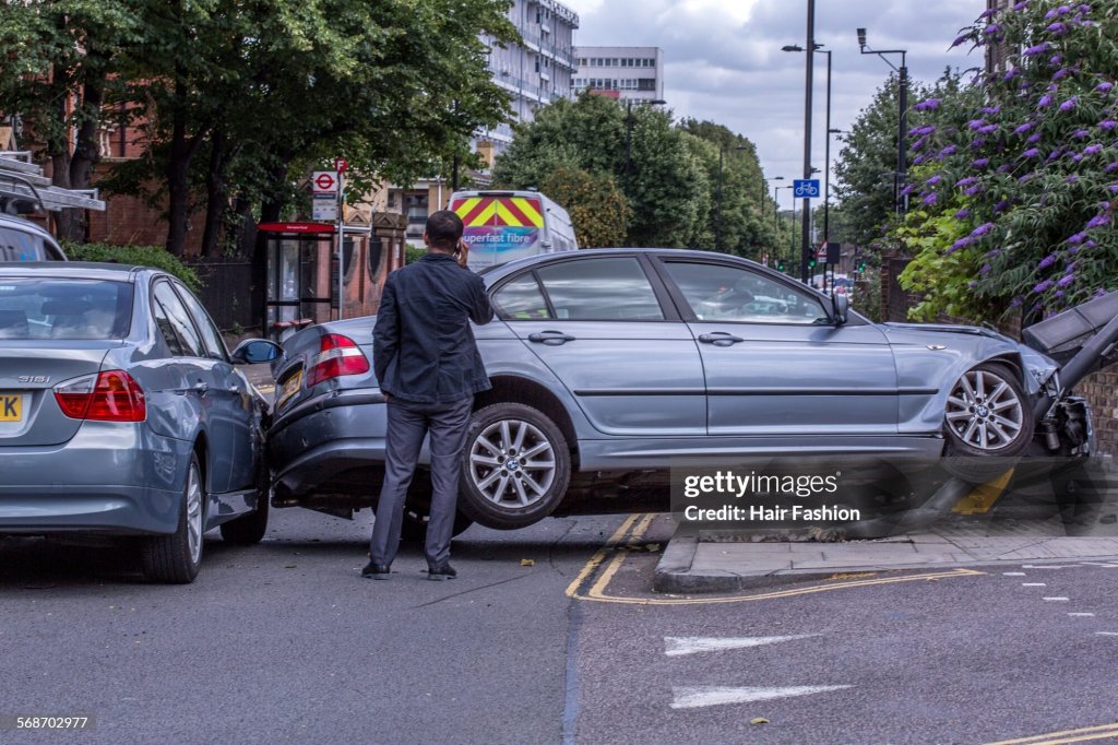 Two cars after a collision at a junction.